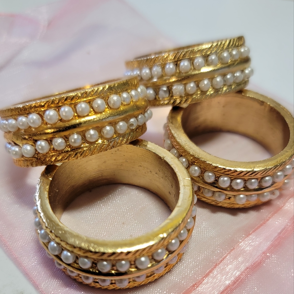 Gold tone and Faux Pearl weighted napkin holders.